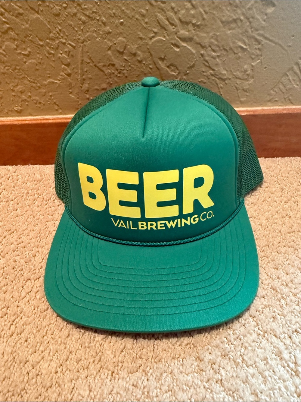 Green Trucker Hat with Yellow Logo
